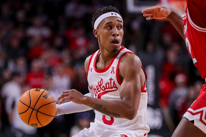 Dec 14, 2022; Cincinnati, Ohio, USA; Cincinnati Bearcats guard Mika Adams-Woods (3) dribbles against the Miami Redhawks in the first half at Fifth Third Arena. Mandatory Credit: Katie Stratman-USA TODAY Sports